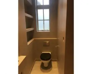 Microcement powder room by Deco Cemento London